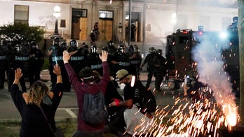 Kenosha officials say about 50 arrests from protests, curfew extended through weekend