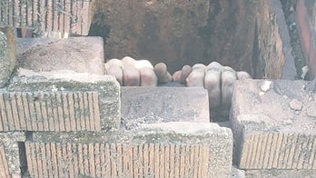 Indiana fugitive gets stuck in chimney while eluding cops