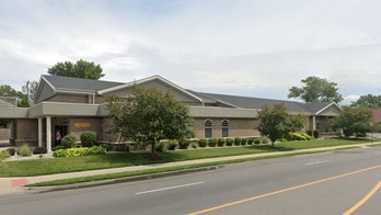 Detroit funeral home says woman ruled dead was still alive