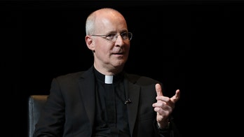 Catholic anti-abortion leaders scrutinize priest's decision to lead prayer at DNC