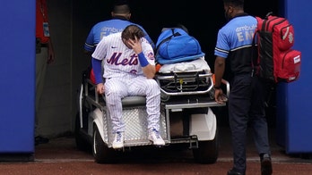 Mets' Jeff McNeil carted off the field after making sensational catch, crashing into wall