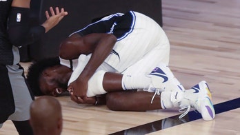 Magic's Jonathan Isaac, who stood for national anthem while others knelt, suffers torn ACL