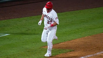 Trout homers twice, helps Angels rally for 10-9 win over A's