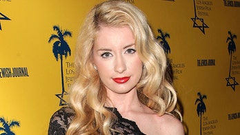 InfoWars correspondent arrested on robbery, domestic violence charges