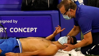 Pain in the neck: Djokovic wins post-hiatus debut; Keys out
