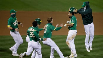 Oakland A's hold off Astros in 13th inning for seventh straight win