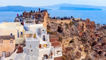 Influencer's sunset video from Santorini shows maskless crowds congregating at tourist spot