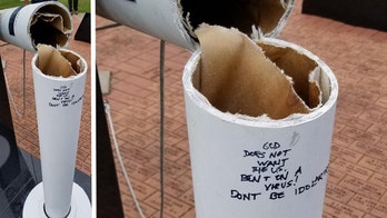 New York man charged with cutting down flagpoles, vandalizing 9/11 memorial