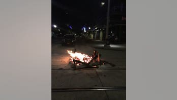 Portland protest 'press' seen throwing objects at police, reporter says