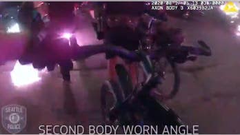 Seattle police release bodycam showing officers being injured by explosives during riots