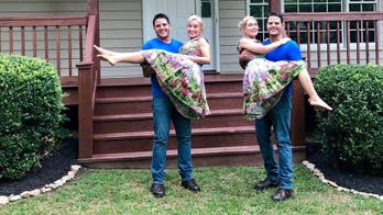 Twin sisters who married twin brothers and live in the same home announce they are pregnant at the same time
