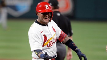 Cardinals Yadier Molina one of 13 members to test positive for COVID-19: 'I look forward to rejoining the team soon'