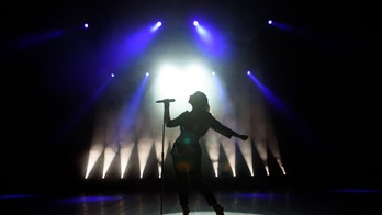 Singing and speaking produce similar numbers of airborne particles, but mass grows with volume, study says