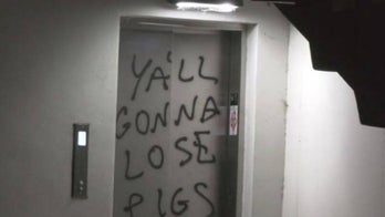 LAPD station vandalized, American flag set on fire