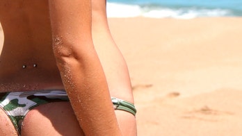 Acrobat handcuffed, removed from Myrtle Beach for wearing thong bikini in viral video