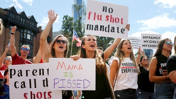 Massachusetts student flu shot mandate draws hundreds of protesters to Boston