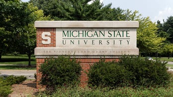 Michigan State football signee charged with extorting girl
