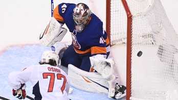 Ovechkin helps Capitals rally past Islanders to avoid sweep
