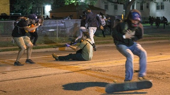 Jacob Blake protests: Kenosha police hunt for suspect with long gun after 2 killed, 1 wounded in unrest