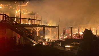 Fires burn North Carolina homes in town where Isaias made landfall