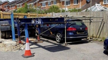 Man builds scaffold around neighbor's car in parking dispute