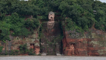 Typhoon Higos adds to southern China's rain and flooding woes