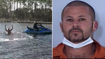 Florida deputy jumps on Jet Ski, chases down fugitive trying to swim away, bodycam video shows