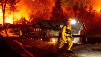 50,000 Californians allowed home as firefighters make progress on historic blazes