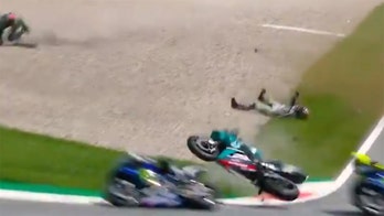 Watch: MotoGP racers avoid wreck as they ride through flying motorcycles