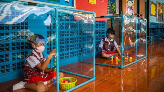 Coronavirus in Thailand: Students seen playing inside pens to protect against spread