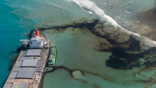 Mauritius drains oil from stricken ship, but environmentalists fear extent of damage