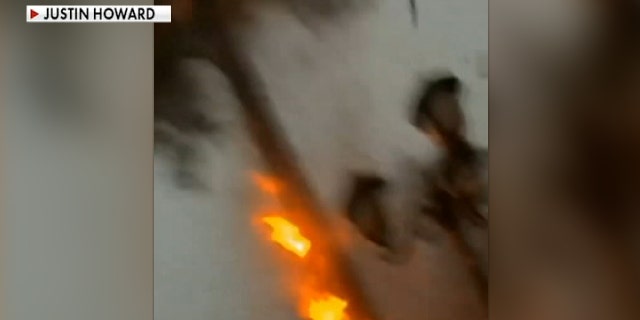 Lightning struck feet away from Justin Howard as it was sitting in the front of his home the Houston area on Wednesday.