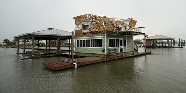 Foodwaters cover the street Friday, Aug. 28, 2020, in Cameron, La., after Hurricane Laura moved through the area Thursday. (AP Photo/David J. Phillip)