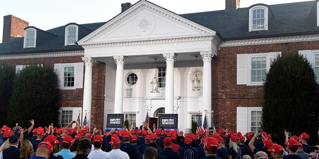 Trump speaks with members of the City of New York Police Department Benevolent Association at a Trump National Golf Club event in Bedminster, NJ on Friday.  (AP Photo / Susan Walsh)