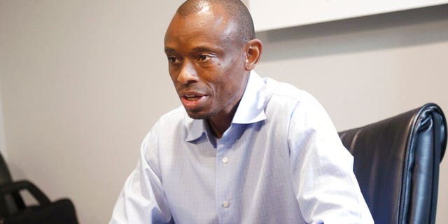 Fifth Congressional District candidate, Democrat Antone Melton-Meaux, answers questions during an interview in his Minneapolis office Wednesday, July 22, 2020. (AP Photo/Jim Mone)