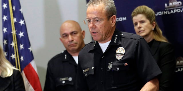 FILE - In this Aug. 6, 2019, file photo, Los Angeles Police Department Chief Michel Moore talks during a news conference at LAPD headquarters in Los Angeles. Los Angeles officials announced Monday, July 27, 2020, a major expansion of the city's signature community policing program that prioritizes building relationships between officers and residents in an effort to reduce crime amid a nationwide reckoning on racial injustice and police brutality. (AP Photo/Marcio Jose Sanchez,File)