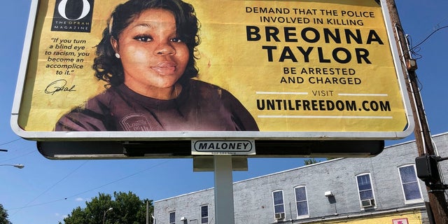 A billboard sponsored by O, The Oprah Magazine, is on display with a photo of Breonna Taylor in Louisville, KY. Twenty-six billboards are going up across Louisville, demanding that the police officers involved in Taylor's death be arrested and charged. (AP Photo/Dylan T. Lovan)