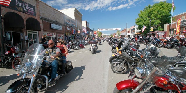 Thousands of bikers rode through the streets for the opening day of the 80th annual Sturgis Motorcycle rally Aug. 7 in Sturgis, S.D. (AP Photo/Stephen Groves)