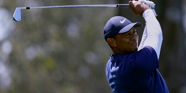Tiger Woods watches his tee shot on the eighth hole during the third round of the PGA Championship golf tournament at TPC Harding Park Saturday, Aug. 8, 2020, in San Francisco. (Associated Press)
