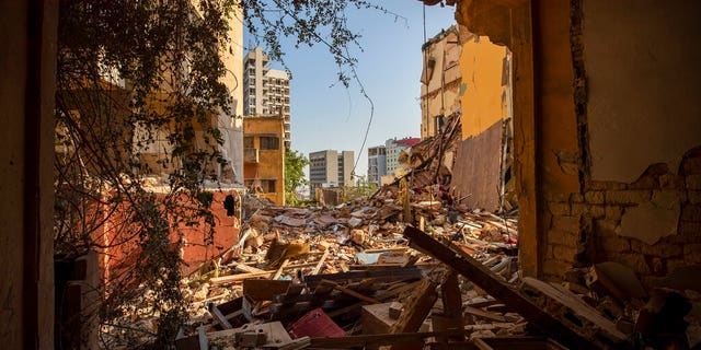 Destroyed buildings are seen from a room heavily damaged in a neighborhood near the site of last year's explosion that hit the seaport of Beirut in Lebanon, Aug. 12, 2020. (Associated Press)