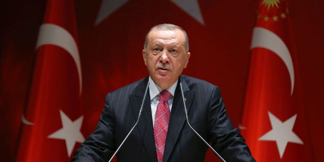 Turkish President Recep Tayyip Erdogan addresses members of his party in Ankara, Turkey on Thursday, August 13, 2020.