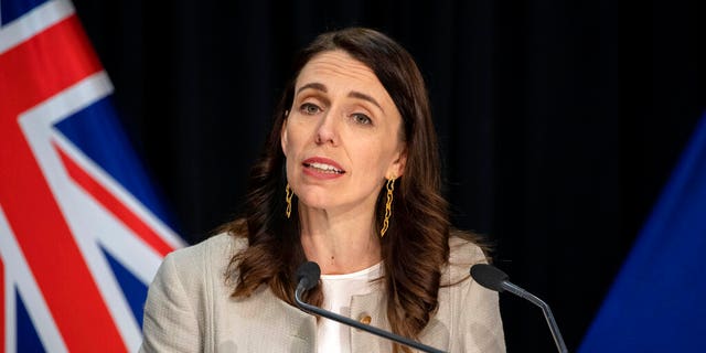New Zealand Prime Minister Jacinda Ardern reacts during a press conference in Wellington, New Zealand, Friday, Aug. 14, 2020. Ardern announced that the three-day lockdown in Auckland would be extended by another 12 days at level 3, the rest of New Zealand will stay at level 2 restrictions as health authorities investigate the source of the first domestic coronavirus outbreak in more than three months. 