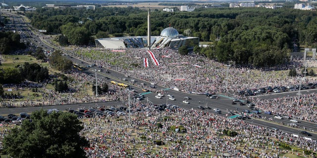 In this Sunday, Aug. 16, 2020 file photo Belarusian opposition supporters rally in the center of Minsk, Belarus. (AP Photo/Dmitri Lovetsky, File)