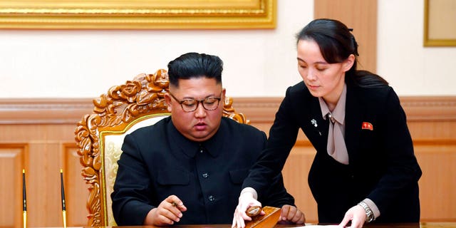 FILE: Kim Yo Jong, right, helps her brother North Korean leader Kim Jong Un sign a joint statement following the summit with South Korean President Moon Jae-in at the Paekhwawon State Guesthouse in Pyongyang, North Korea. 