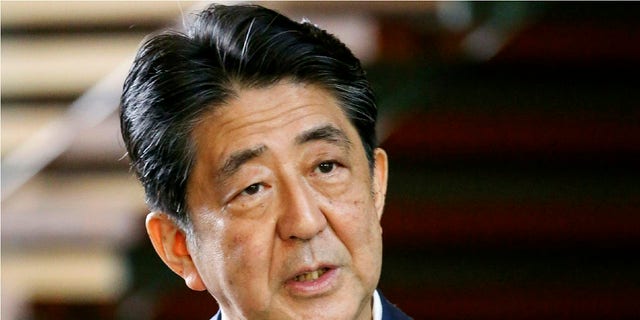 Japanese Prime Minister Shinzo Abe speaks to reporters at his official residence in Tokyo Monday, Aug. 24, 2020. (Kyodo News via AP)