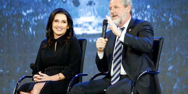 Rev. Jerry Falwell Jr., right, and his wife, Becki during after a town hall at a convocation at Liberty University in Lynchburg, Va. 