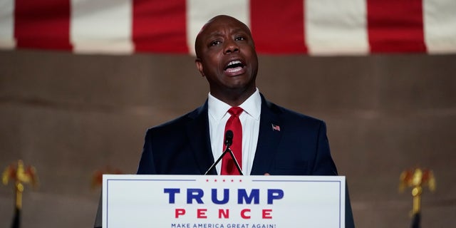 Sen. Tim Scott, R-S.C., speaks during the Republican National Convention from the Andrew W. Mellon Auditorium in Washington, Monday, Aug. 24, 2020. (AP Photo/Susan Walsh)