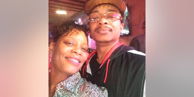 In this September 2019 selfie photo taken in Evanston, Ill., Adria-Joi Watkins poses with her second cousin Jacob Blake. He is recovering from being shot multiple times by Kenosha police last weekend. His lawyer said Friday that he was no longer restrained in his hospital bed. (Courtesy Adria-Joi Watkins via AP)
