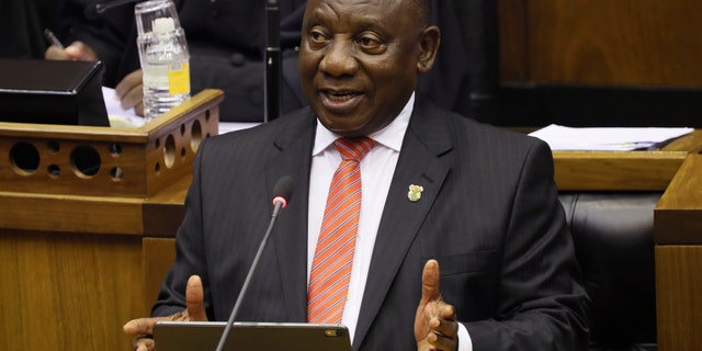 In this Thursday, Feb. 13, 2020 file photo, South African President Cyril Ramaphosa delivers his State of the Nation Address in Cape Town, South Africa. (Sumaya Hisham/Pool Photo via AP, File)