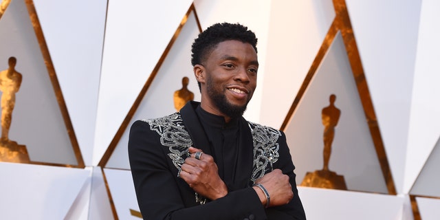 Chadwick Boseman arrives at the Oscars at the Dolby Theatre in Los Angeles. 